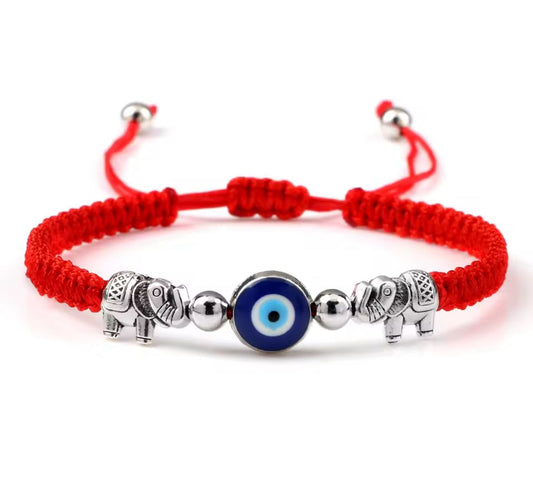 Bracelet œil/éléphant fil rouge