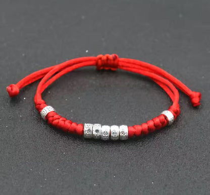 Bracelet fil rouge